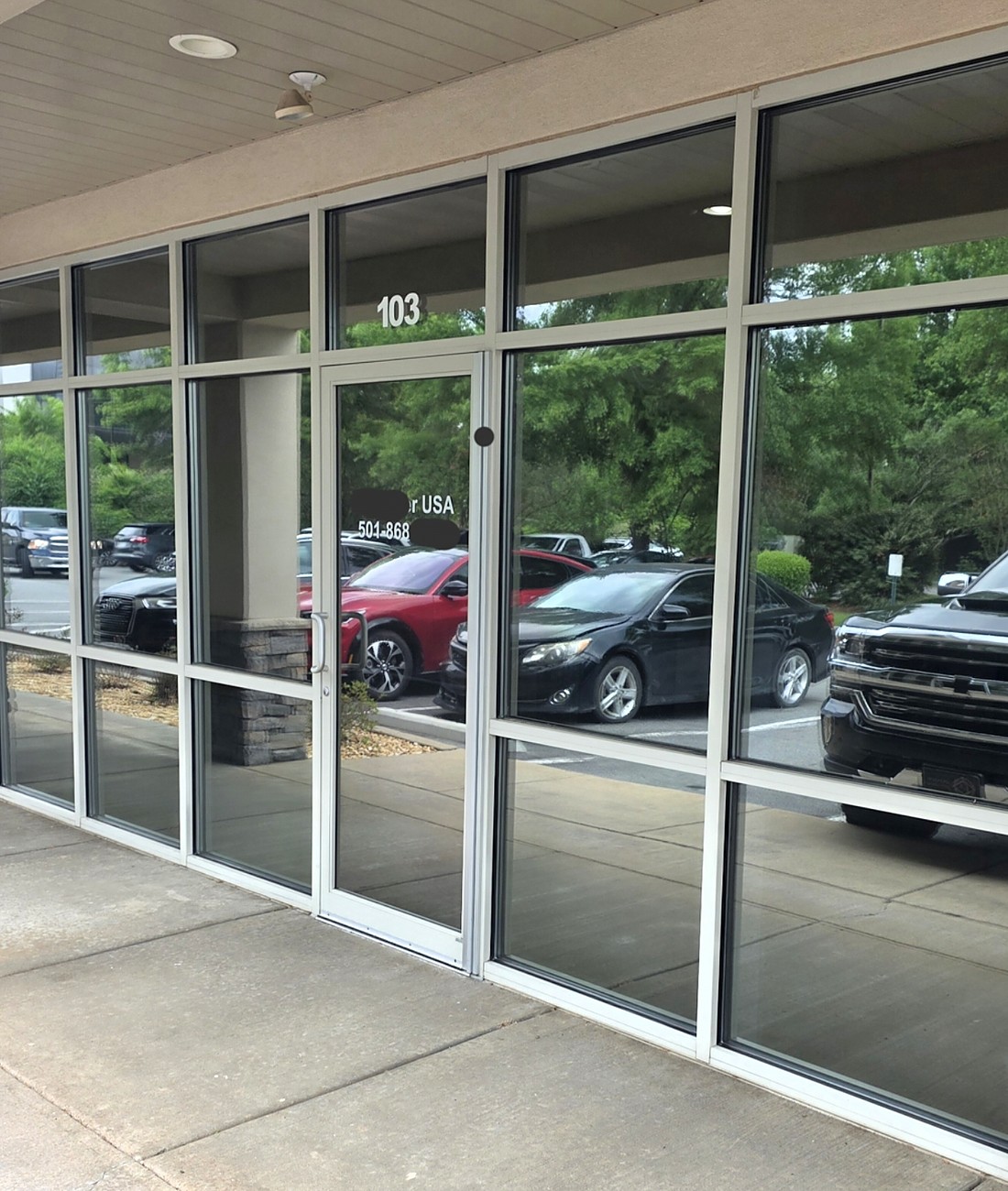 Commercial storefront with tinted windows in Central Arkansas